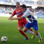 Una jugada del encuentro entre CD Tenerife y Sporting de Gijón. | SERGIO MÉNDEZ