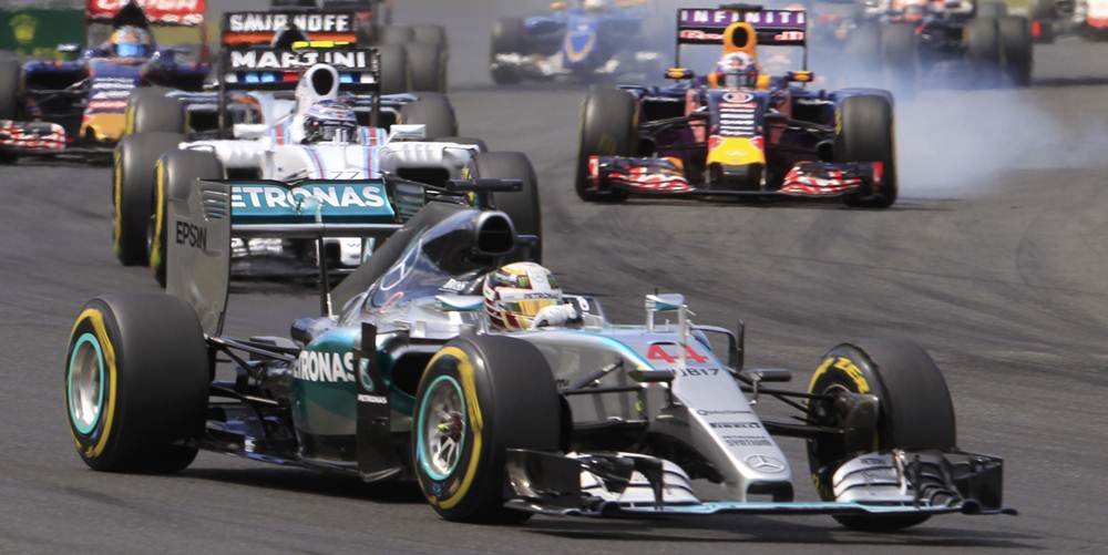Lewis Hamilton y Nico Rosberg en la salida. | REUTERS