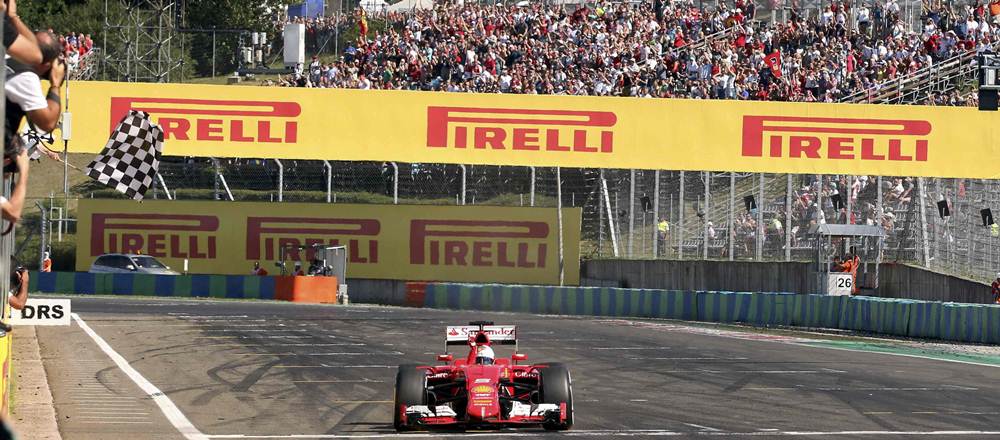 Sebastian Vettel cruzando la meta.  | REUTERS
