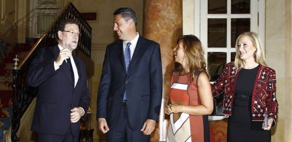 Rajoy en la presentación de la conferencia del candidato del PP a la Generalitat, Xavier García Albiol. | EP