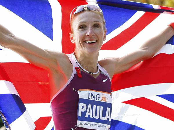 Paula Radcliffe of England holds the Union Jack after winning the Women's division of the 2008 New York City Marathon in New York