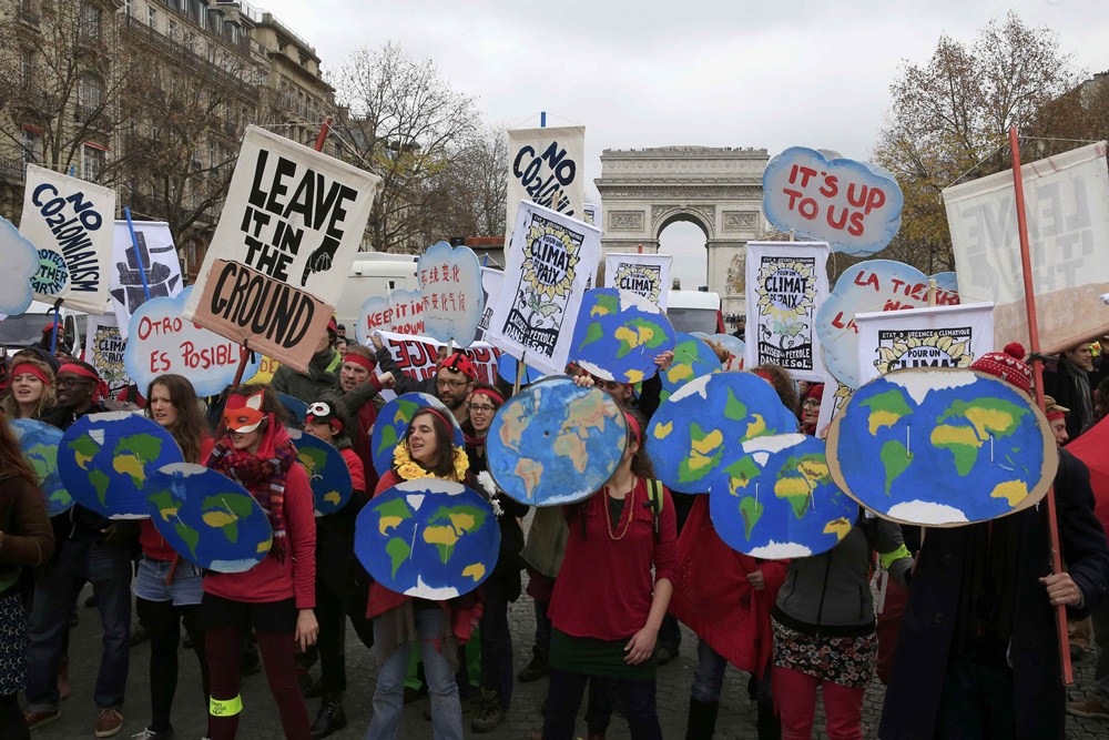 Environmentalists demonstrate in Paris as the World Climate Change Conference 2015 (COP21) continues at Le Bourget