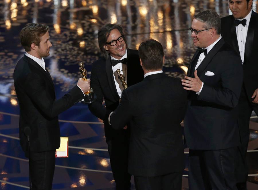 Charles Randolph and Adam Mckay receive the Oscars for Best Adapted Screenplay for the movie “The Big Short” at the 88th Academy Awards in Hollywood