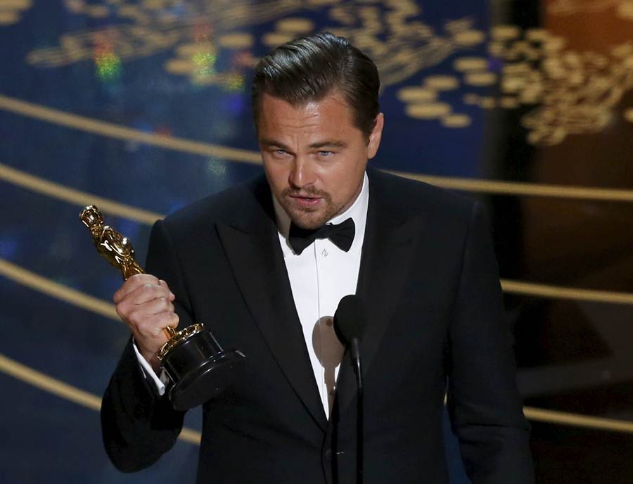 Leonardo DiCaprio accepts the Oscar for Best Actor for the movie “The Revenant” at the 88th Academy Awards in Hollywood