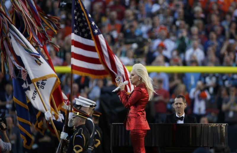 Lady Gaga sings the U.S. National Anthem before the start of the NFL's Super Bowl 50 between the Carolina Panthers and the Denver Broncos in Santa Clara