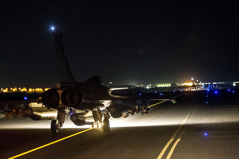 A French fighter jet taxis along the runway in an undisclosed location, in this handout picture released by the ECPAD