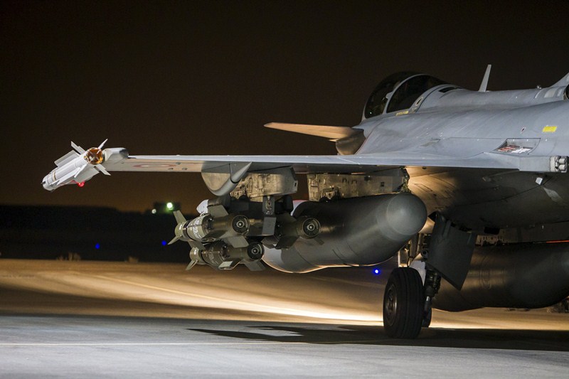 A French fighter jet is seen on the runway at an undisclosed location, in this picture released by the ECPAD